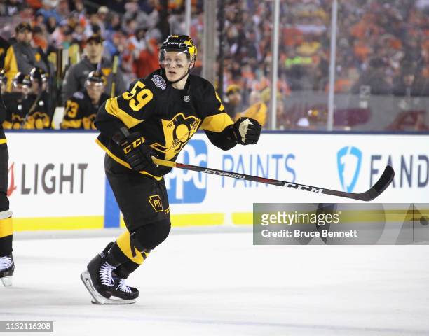Jake Guentzel of the Pittsburgh Penguins skates against the Philadelphia Flyers during the 2019 Coors Light NHL Stadium Series game at the Lincoln...