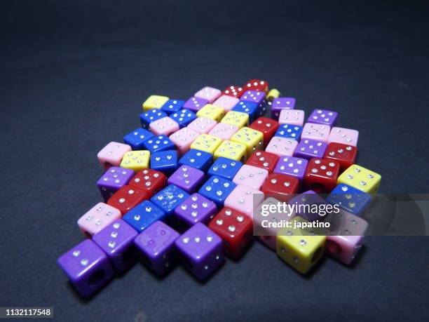 dice of different colors - grupo de objetos stock-fotos und bilder