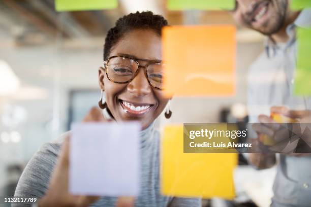 business people brainstorming ideas in office - person looking through window stock pictures, royalty-free photos & images