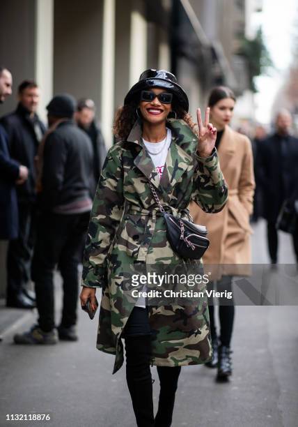 Model is seen wearing hat, camouflage jacket outside Dolce & Gabbana on Day 5 Milan Fashion Week Autumn/Winter 2019/20 on February 24, 2019 in Milan,...