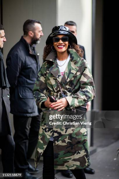 Model is seen wearing hat, camouflage jacket outside Dolce & Gabbana on Day 5 Milan Fashion Week Autumn/Winter 2019/20 on February 24, 2019 in Milan,...