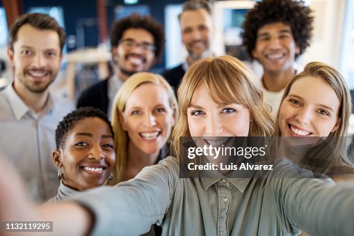 Successful business team taking selfie Successful business team taking selfie