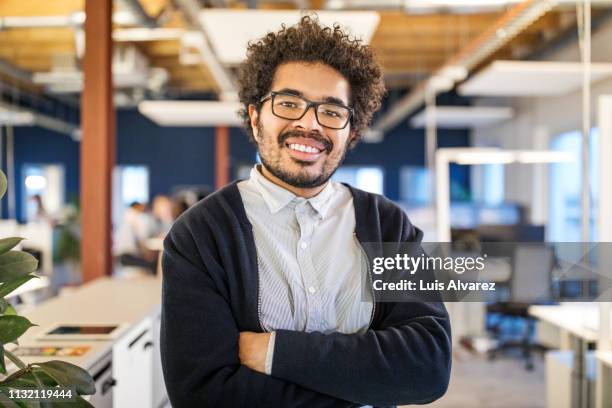 portrait of confident african businessmen - hipster brille stock-fotos und bilder