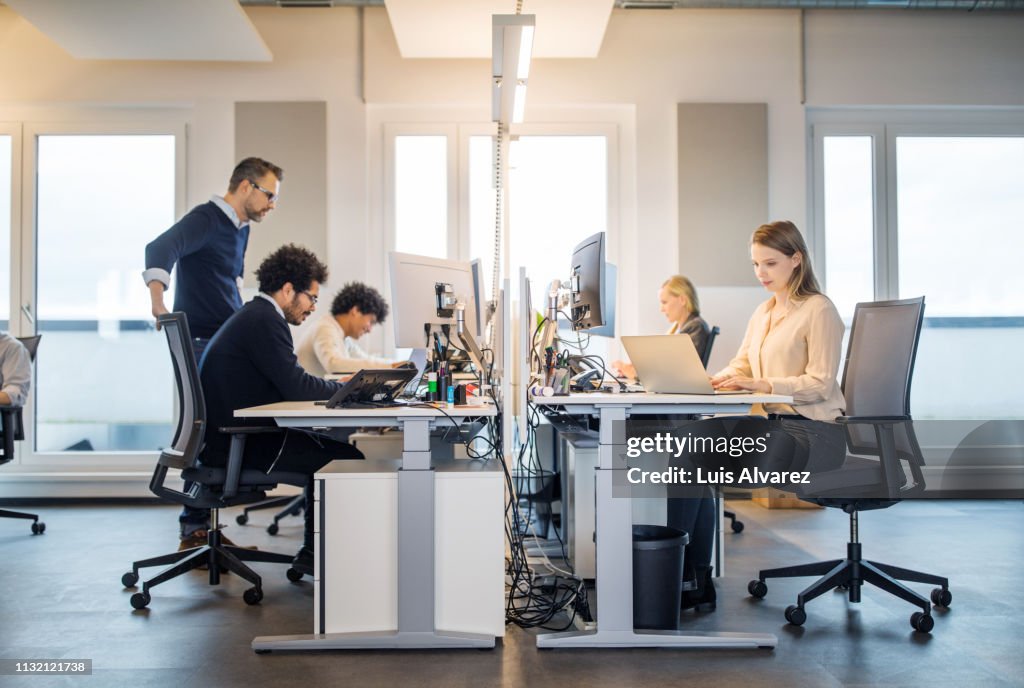 Business people working in a small office