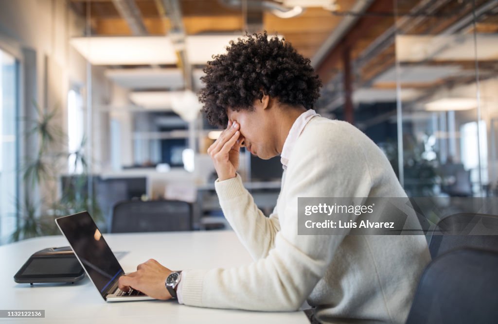 Businessman working late in office