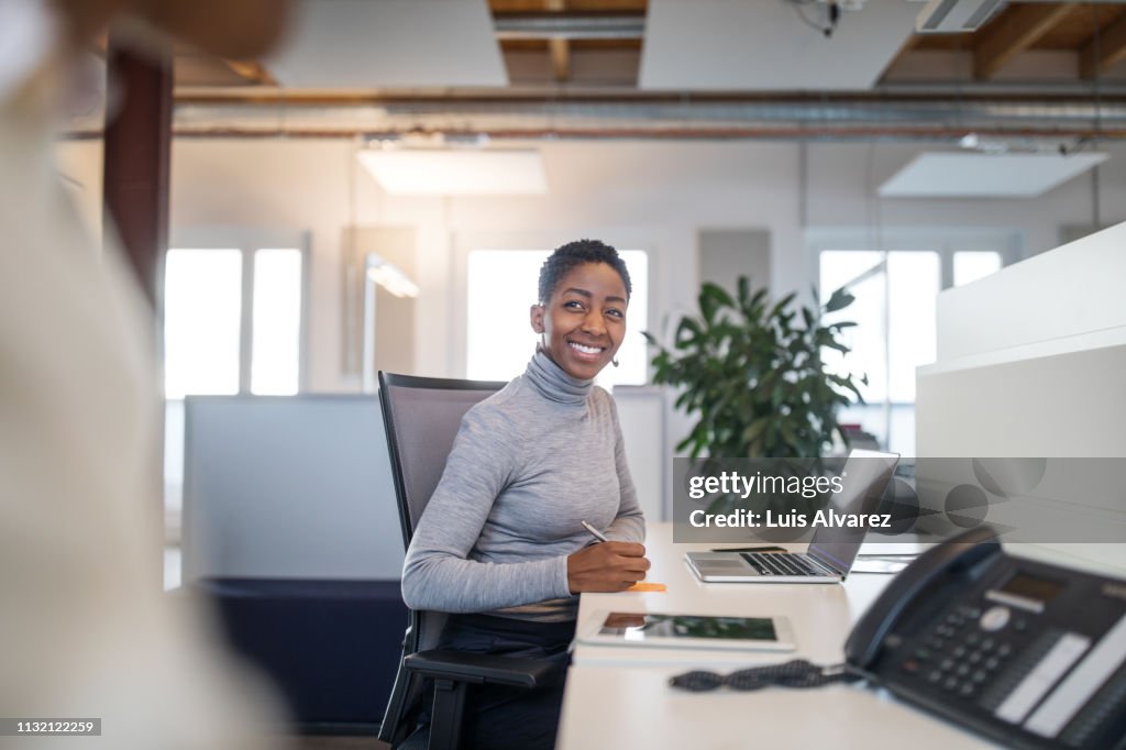 Female professional working at her desk