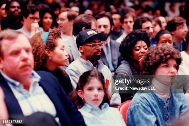 Film director Spike Lee , watches his friend Mark Jackson of the New York Knicks basketball team play against the Washington Bullets at Madison...