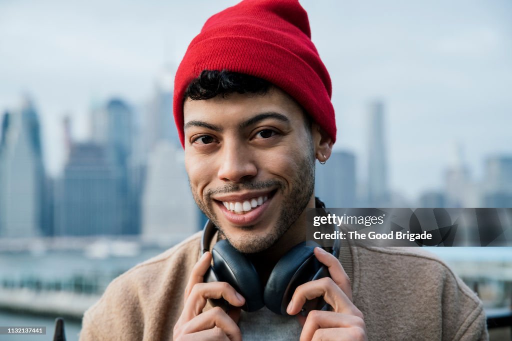 Portrait of smiling young man with headphones