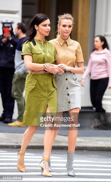 Adriana Lima and Josephine Skriver are seen during a photoshoot for Maybelline in SoHo on March 22, 2019 in New York City.