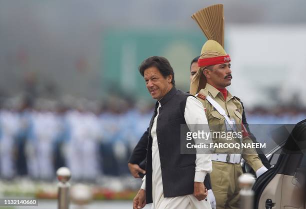 Pakistani Prime Minister Imran Khan arrives to attend the Pakistan Day parade in Islamabad on March 23, 2019. - Pakistan National Day commemorates...