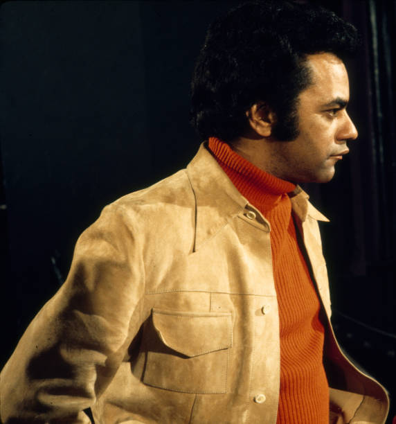 American singer Johhny Mathis rehearses for his upcoming New Year's Eve performance at the Hilton Hotel nightclub, Las Vegas, Nevada, late 1971. The...