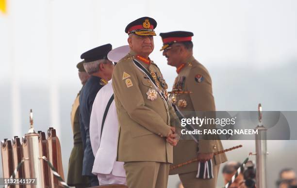Pakistan Army Chief General Qamar Javed Bajwa stands before the start of the Pakistan Day parade in Islamabad on March 23, 2019. - Pakistan National...