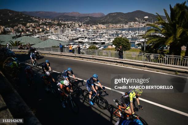 Breakaway group rides through the coastal town of Varazze during the one-day classic cycling race Milan - San Remo on March 23, 2019.