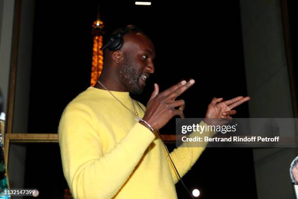 Virgil Abloh performs during the launch of Evian and Virgil Abloh’s limited-edition “One Drop can make a Rainbow” collection at Theatre National de...