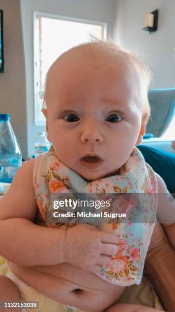 Smiling newborn baby.