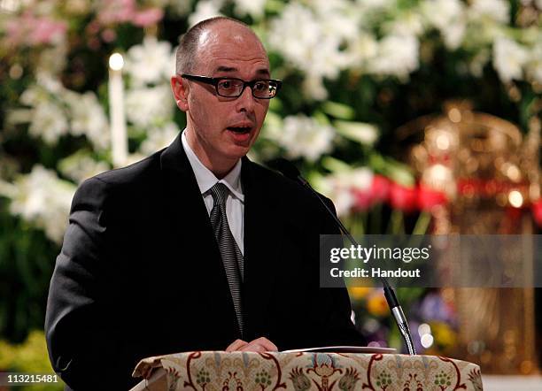 In this handout image provided by Getty Images, Pancho Bernasconi, Vice President of Editorial at Getty Images, speaks at a memorial service for...