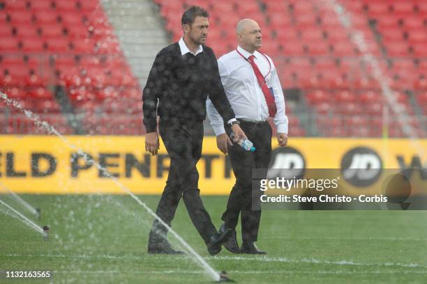 Perth Glory coach Tony Popovic and Western Sydney Wanderers CEO John Tsatsimas chat prior to the round 20 A-League match between Western Sydney...