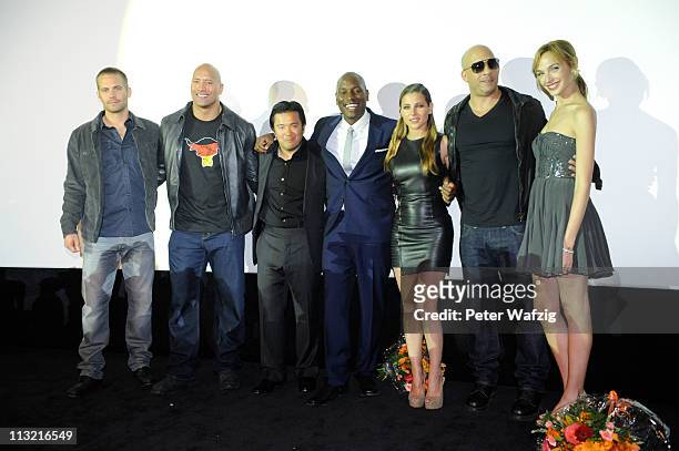 Paul Walker, Dwayne Johnson, Justin Lin, Tyrese Gibson, Elsa Pataky, Vin Diesel and Gal Godot pose at the 'Fast & Furious 5' Germany Premiere on...