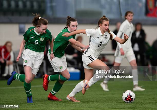 Marleen Rohde of Germany takes on Orla Prendergast and Rebecca Cooke of Ireland during the UEFA Elite Round match between Ireland U17 Girl's and...
