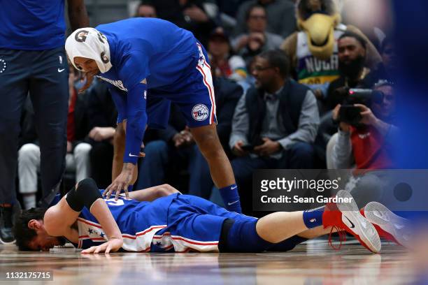 Boban Marjanovic of the Philadelphia 76ers is injured during the second half of a game against the New Orleans Pelicans at the Smoothie King Center...