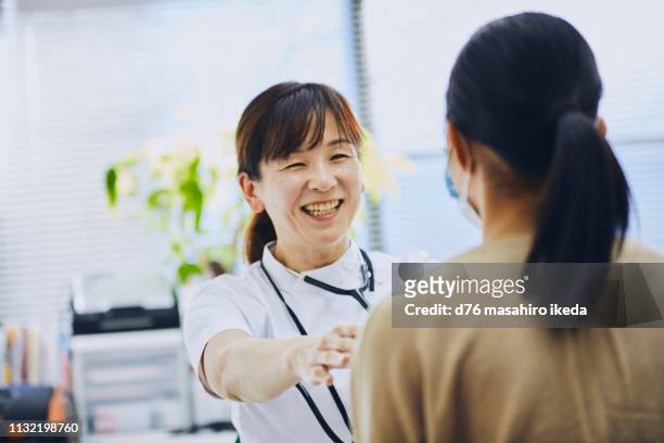 local hospital - japan and medical and hospital stock pictures, royalty-free photos & images