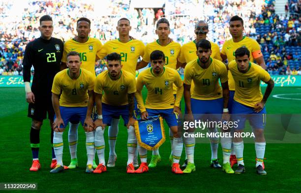 Brazil's team line up prior to an international friendly football match between Brazil and Panama at the Dragao Stadium in Porto on March 23, 2019 in...