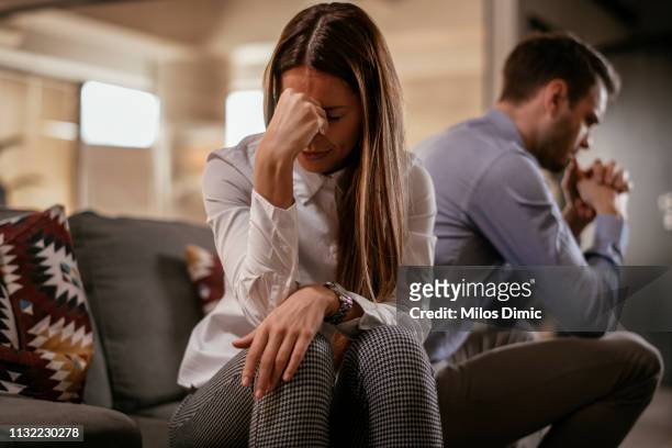unhappy young couple - relationship difficulties stock pictures, royalty-free photos & images