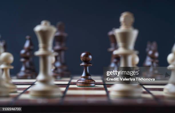 pieces on chess board - chess board stock pictures, royalty-free photos & images