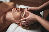 Therapist make anti age forehead wrinkles massage