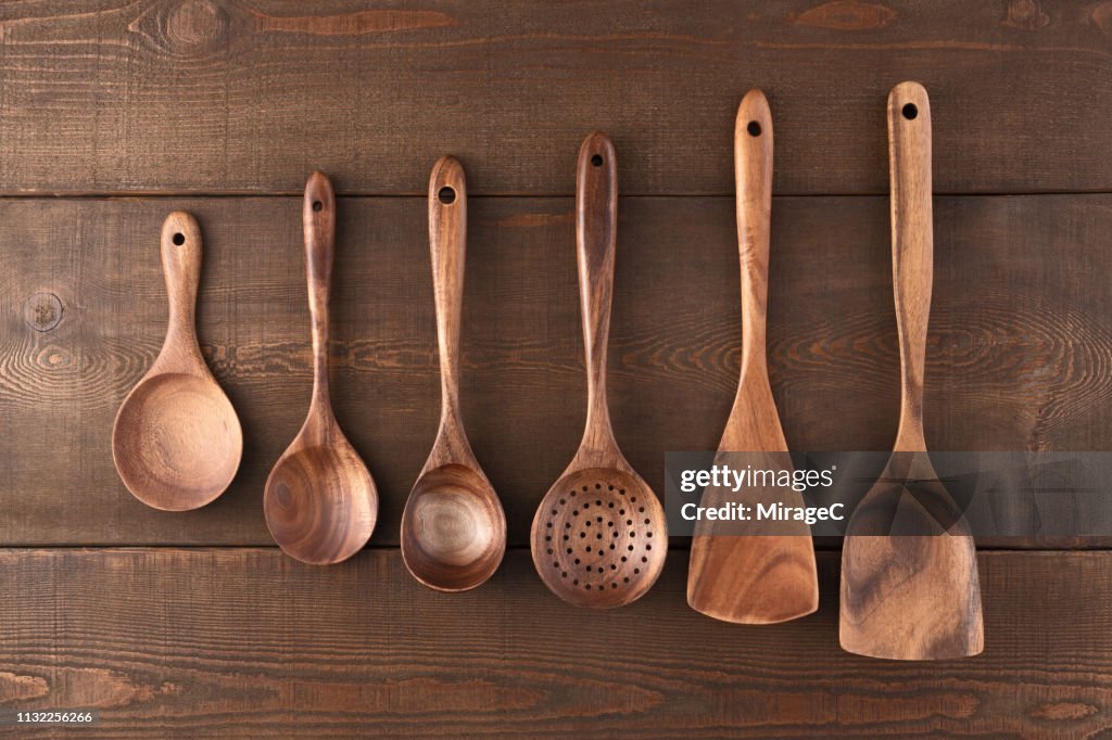 Wooden Kitchen Utensils on Wood Table