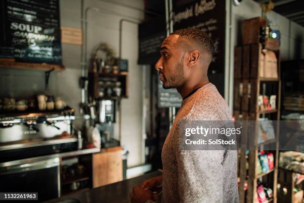 waiting to pay in a cafe - customers lining up stock pictures, royalty-free photos & images