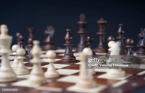 chess pieces on board - chess board stock pictures, royalty-free photos & images
