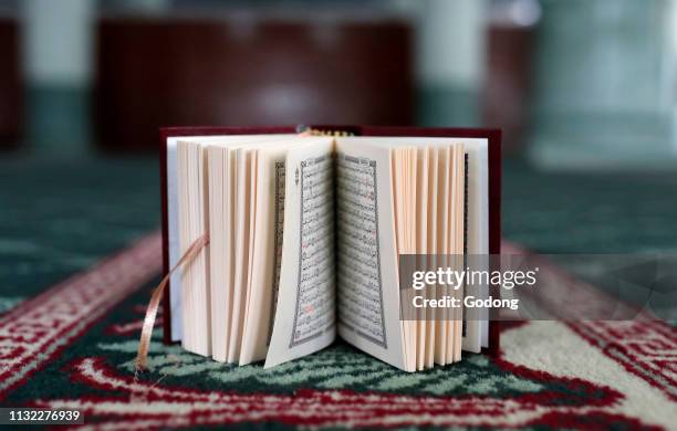 The Green Mosque. Arabic Holy Quran . Singapore.