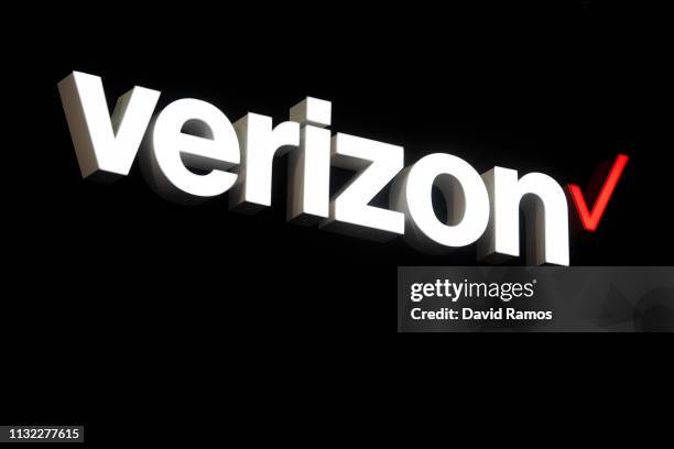 Logo sits illumintated outside the Verizon booth on day 2 of the GSMA Mobile World Congress 2019 on February 26, 2019 in Barcelona, Spain. The annual...