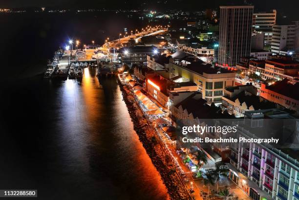 night view of sandakan city, sabah - kota kinabalu beach stock pictures, royalty-free photos & images