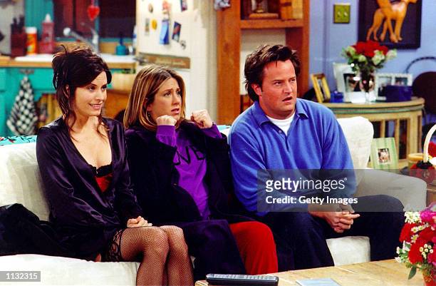 Actors Courteney Cox Arquette , Jennifer Aniston and Matthew Perry are shown in a scene from the NBC series "Friends". The series received 11 Emmy...