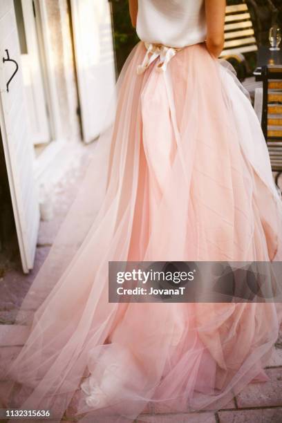 bride in pink wedding dress - pink dress stock pictures, royalty-free photos & images