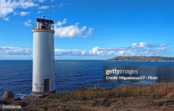 laxe lighthouse on the coast of death, galicia (spain) - paisaje escénico stock-fotos und bilder