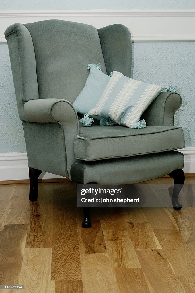 Vintage green chair in sitting room