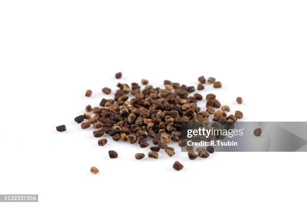 decorticated cardamom seeds pile - cardamom stock pictures, royalty-free photos & images