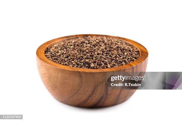 decorticated cardamom seeds pile - cardamom stock pictures, royalty-free photos & images