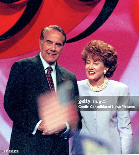 American politician former US Senator Bob Dole and his wife, former politician Elizabeth Dole, stand on stage after his acceptance speech on the...