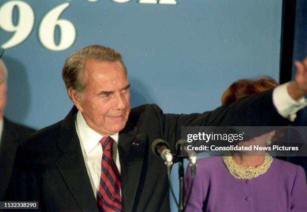 Former US Senator Bob Dole waves to supporters after conceding the Presidential Election during an election night party at the Renaissance Hotel,...