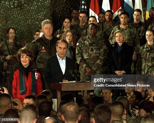 American politician former US Senator Bob Dole speaks to assembled US soldiers at Eagle Base's 21 Club, Tuzla, Bosnia and Herzegovina, December 22,...
