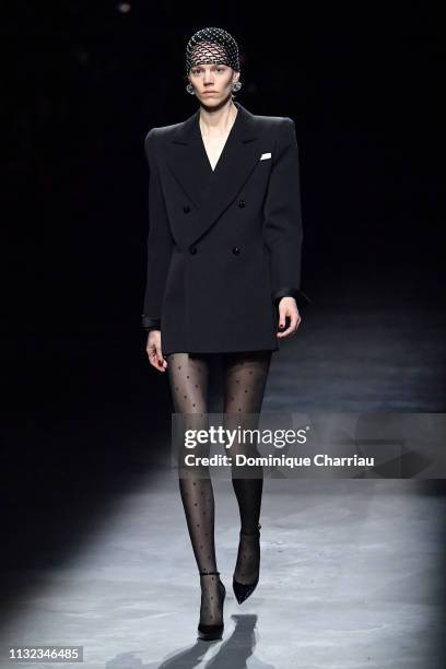 Model Freja Beha walks the runway during the Saint Laurent show as part of the Paris Fashion Week Womenswear Fall/Winter 2019/2020 on February 26,...