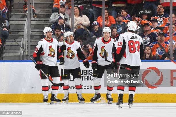 Oscar Lindberg, Brian Gibbons, Magnus Paajarvi and Christian Jaros of the Ottawa Senators celebrate after a goal during the game against the Edmonton...