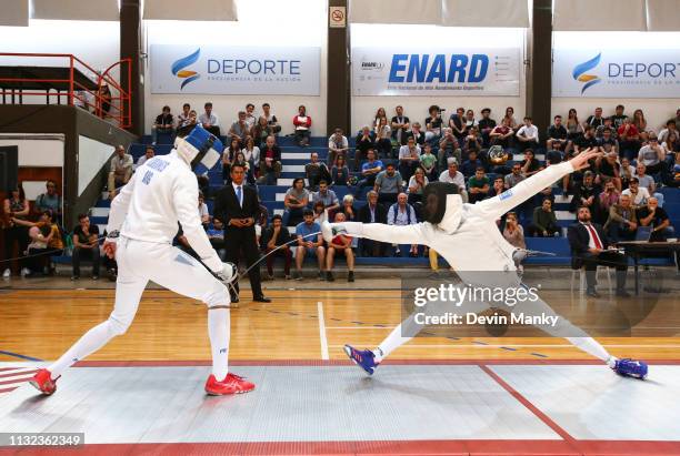Jesus Andres Lugones Ruggeri of Argentina fences Alexandre Bardenet of France during finals competition at the Men's Epee World Cup on March 23, 2019...