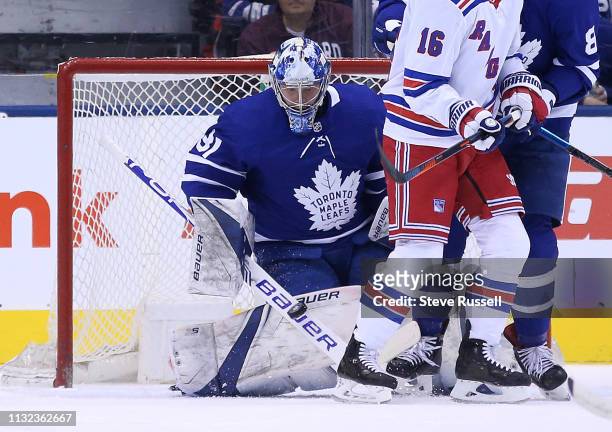 Toronto Maple Leafs goaltender Frederik Andersen makes a stop around a New York Rangers center Ryan Strome screen as the Toronto Maple Leafs play the...