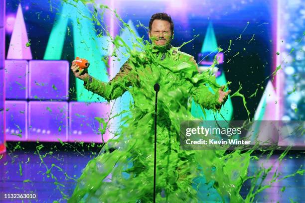 Chris Pratt gets slimed onstage with Favorite Butt-Kicker award for 'Jurassic World: Fallen Kingdom' at Nickelodeon's 2019 Kids' Choice Awards at...