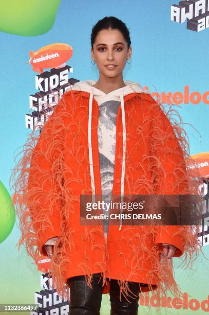 English actress Naomi Scott arrives for the 32nd Annual Nickelodeon Kids' Choice Awards at the USC Galen Center on March 23, 2019 in Los Angeles.